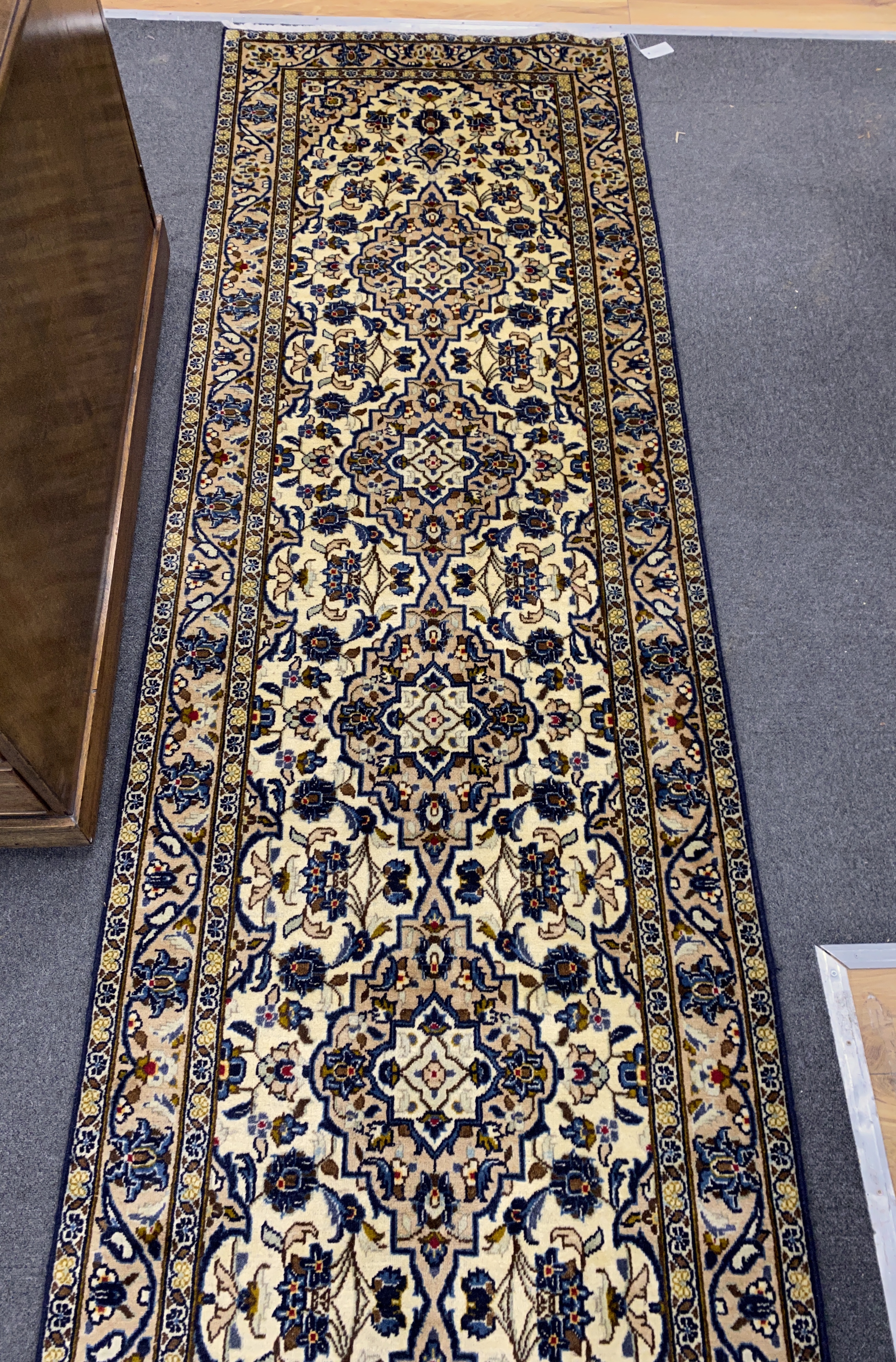 A North West Persian ivory ground runner, 400 x90cm